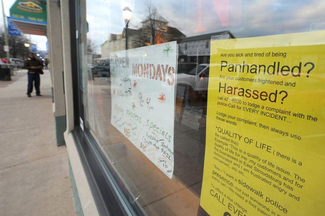 Panhandling is not a new or isolated problem. A number of businesses on Crystal Street in East Stroudsburg put signs in their windows in 2012 addressing panhandling and loitering there. (Pocono Record file photo)