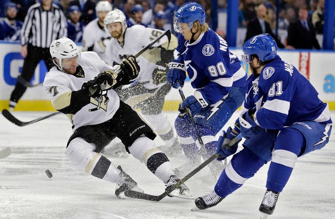 Pittsburgh center Matt Cullen, left, is knocked down by Tampa Bay Lightning center Vladislav Namestnikov (90) during the third period of Wednesday's Game 3 of the NHL's Eastern Conference finals in Tampa, Fla. The Penguins lead the series, 2-1. Game 4 is Friday.