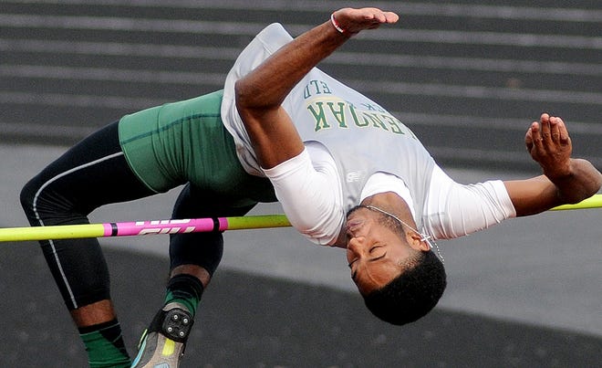 GlenOak's J.T. Hampton clears 6'7" to win the high jump at the North Canton Division I district championship. (CantonRep.com / Ray Stewart)