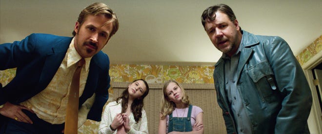 Caption: (L-r) RYAN GOSLING as Holland March, DAISY TAHAN as Jessica, ANGOURIE RICE as Holly and RUSSELL CROWE as Jackson Healy in Warner Bros. Pictures' action comedy "THE NICE GUYS," a Silver Pictures production, a Warner Bros. Pictures release.