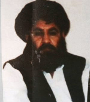 FILE - In this Saturday, Aug. 1, 2015 file photo, shows Taliban leader Mullah Mansour. The U.S. conducted an airstrike Saturday, May 21, 2016, against the Taliban leader the Pentagon said, and a U.S. official said Mansour was believed to have been killed. Pentagon press secretary Peter Cook said the attack occurred in a remote region along the Afghanistan-Pakistan border. He said the U.S. was studying the results of the attack. (AP Photo/Rahmat Gul, File)