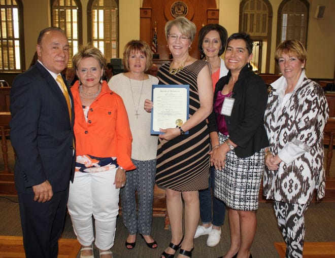 L to R: Parish President Kenny Matassa, Pam Dawson, Councilwoman Teri Casso, Chairperson Kerry Songy, Audrey Boudreaux, Charla Johnson and Martha Collins.