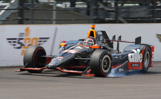 Alex Tagliani, of Canada, wrecks during qualifications for the Indianapolis 500 auto race at Indianapolis Motor Speedway in Indianapolis, Sunday, May 22, 2016. (AP Photo/Kirk Stierwalt)