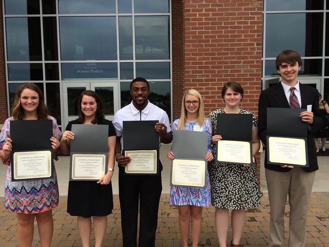 From left, Mikayla Stuart and Beth Jennings, of Kings Mountain High School; Kameron Hawk and Julia Cass, of Shelby High School; Andi Morgan, of Crest High School; and Alex Eaker, of Burns High School, were the Cleveland County recipients of the Lutz Foundation Scholarship. Special to The Star