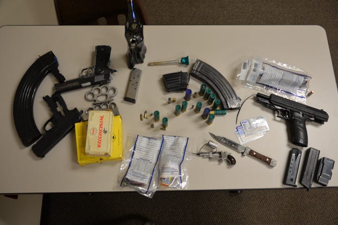 Dallas Police executed search warrants Sunday morning on an investigation into possible stolen weapons. They seized guns, ammunition and drugs, according to police.

Photos by the Dallas Police Department