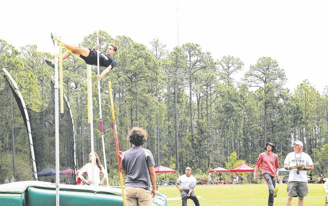 Kobe Babin goes up and over for a 12-foot vault at Emerald Coast Middle School earlier this season. The vault was a school record for Destin Middle School.