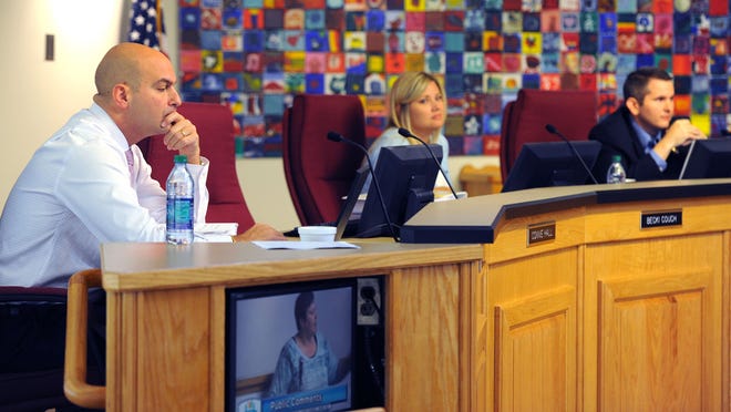 Duval schools Superintendent Nikolai Vitti (from left) and School Board members Rebecca Couch and Jason Fischer listen to comments during Monday's meeting.