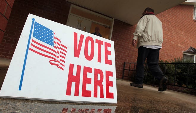 (Photo Mike Hensdill/The Gaston Gazette ) A voter turns out in Lowell on Election Day in November.