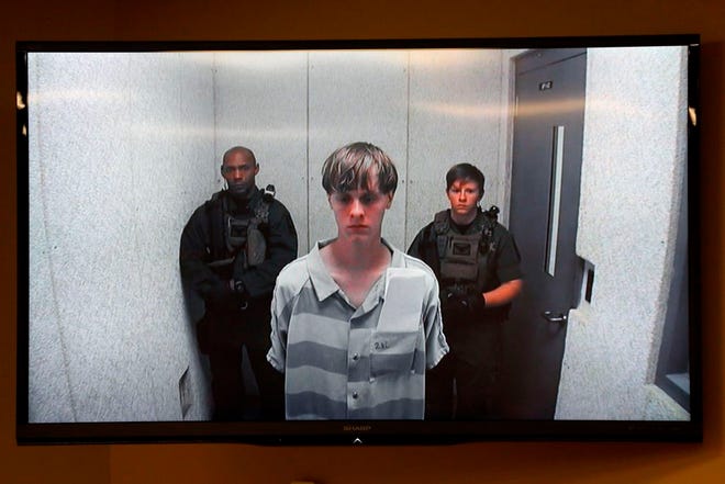 Dylann Roof appears at a bond hearing court in North Charleston, S.C., June 19, 2015. Roof is accused of killing nine people inside Emanuel African Methodist Episcopal Church in Charleston on June 17. (Grace Beahm/The Post And Courier via AP, Pool, File)