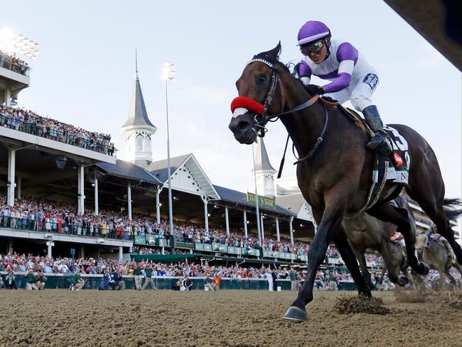 In this May 7, 2016, file photo, Mario Gutierrez rides Nyquist to victory during the 142nd running of the Kentucky Derby horse race at Churchill Downs in Louisville, Ky.