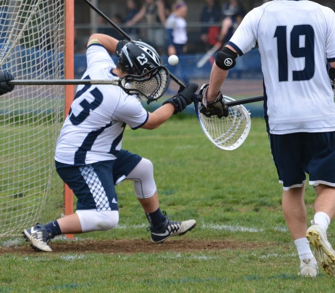 STA goalie Jay Gallipo makes a save against Windham during Division II boys lacrosse action Tuesday.