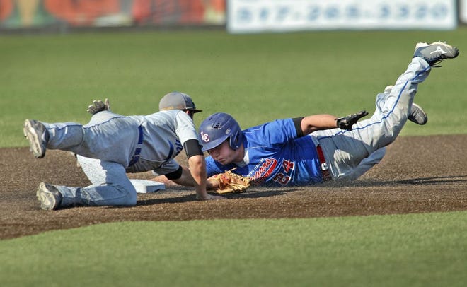 Lenawee Christian's John Gamel, right, slides against Madison's Gunner Rainey during a doubleheader Tuesday at Nicolay Field.