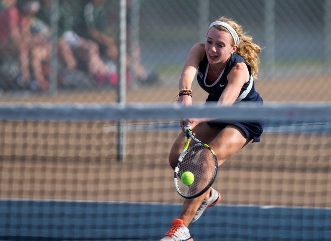 Exeter High School senior Kate Lietz charges to make a return during Wednesday's Division I girls tennis quarterfinal match against Dover. Stewart Mellentine Photo