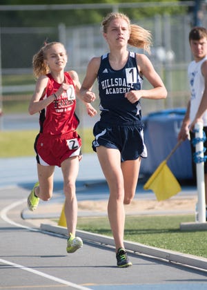 Andrea Jagielski, of Hillsdale Academy won the 1,600 meter run with a time of 5:11.01. TODD LANCASTER PHOTO
