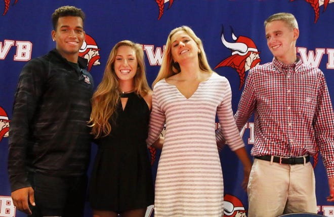 From left, FWB's Corey Bonner, Brooke Crane, Maddie Fulmer and Dillon Rice signed with their respective colleges on Wednesday.