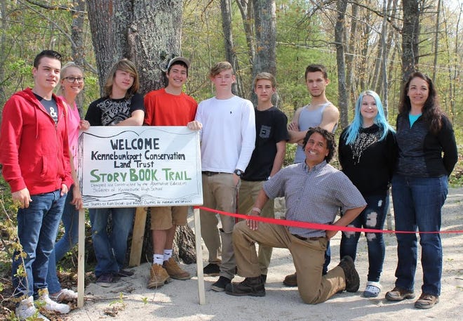 Students in the Alternative Education Program at Kennebunk High School built the new Story Book Trail at the Kennebunkport Conservation Trust. Pictured from left to right are Jake Patterson, Brittany Guillemette, Ray Therrien, David Patoine, Anthony Dan, Jeremy Nelson, Nick Buzzell, Haley Ham, and teachers Peg Levasseur and Ed Sharood.

Photo by Donna Buttarazzi/Seacoastonline