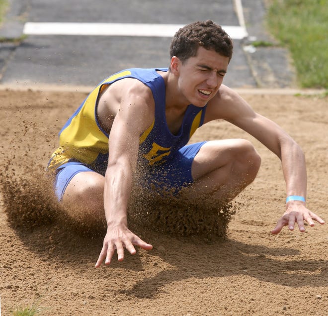 East Cantons Mitch Mitchell jumps in the D3 regional track meet at Fairless.



CantonRep.com / Scott Heckel