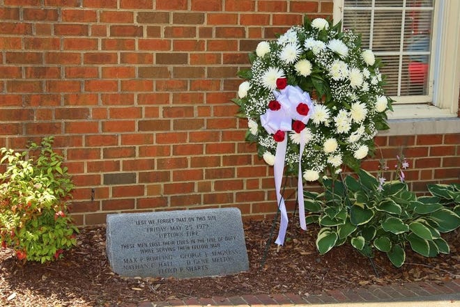 A wreath was placed at the stone memorial for the four firefighters and one city of Shelby gas worker that died on May 25, 1979 in an uptown Shelby blast on West Warren Street. 

Raymond Beck/Special to The Star