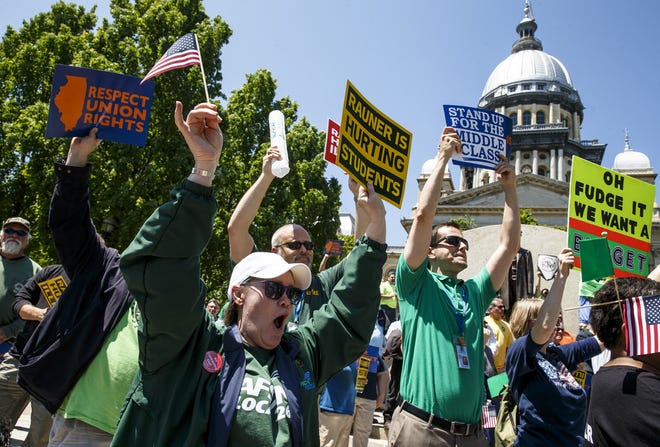 Debby Rigor of Petersburg screams in support with fellow AFSCME members during the "Rauner is Hurting Illinois" rally at the Illinois State Capitol, Wednesday, May 18, 2016, in Springfield, Ill. Justin L. Fowler/The State Journal-Register