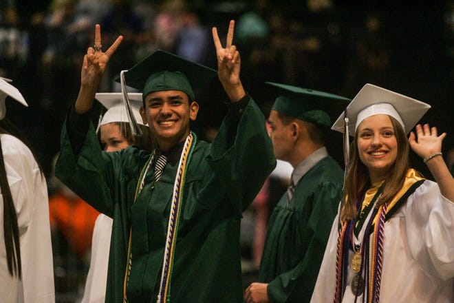 Flagler Palm Coast High School students are all smiles during the Class of 2016's graduation ceremony at the Ocean Center in Daytona Beach on Thursday. News-Journal/LOLA GOMEZ