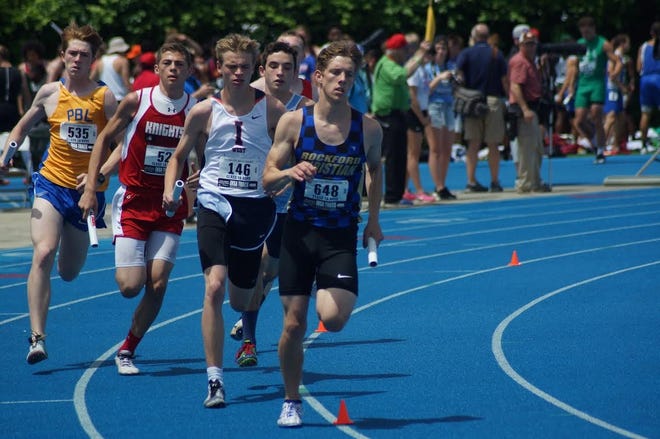 Rockford Christian's Brian Smith leads the pack in the opening leg of the 3,200-meter relay. The Royal Lions not only won the heat, but they lead the entire field with a time of 7 minutes, 59.96 seconds heading into Saturday's finals. DAN CHAMNESS/CORRESPONDENT/RRSTAR.COM