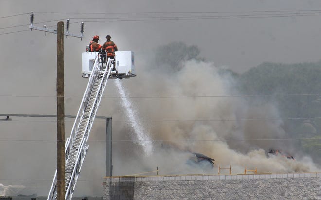Fire at the One Daytona site in Daytona Beach as roofing material at the new theater caught fire Friday, May 27, 2016 News-Journal/JIM TILLER
