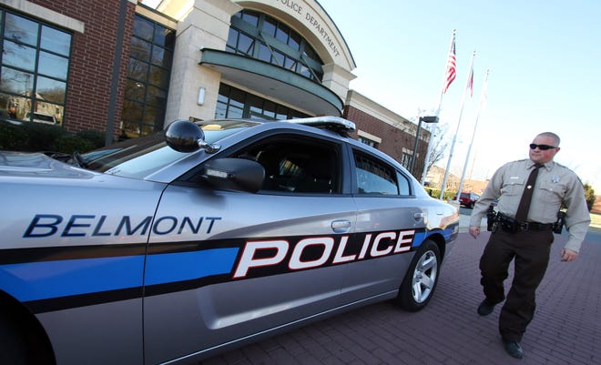 (File photo Mike Hensdill/The Gaston Gazette ) The Belmont Police Department received staffing assistance from the Gaston County Sheriff's Office from November through April. Here, Sheriff Deputy Kevin Lail walks to the Belmont police cruiser that he used during his shift Thursday afternoon, Feb. 11, 2016 at the Belmont Police Department.