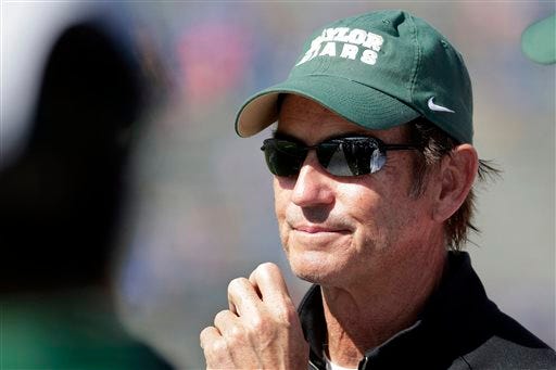 Baylor University's board of regents says it will fire head football coach Art Briles, pictured, and re-assign university President Kenneth Starr in response to questions about its handling of sexual assault complaints against players.