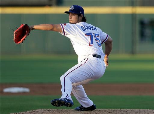 FILE- In this May 6, 2016, file photo, Texas Rangers pitcher Yu Darvish delivers during a rehab start for Triple-A Round Rock Express against the New Orleans Zephyrs during a baseball game, Friday, May 6, 2016, in Austin, Texas. Darvish missed the end of the 2014 season with right elbow inflammation and had more issues while making just one spring appearance last year before undergoing Tommy John surgery. (AP Photo/Eric Gay, File)