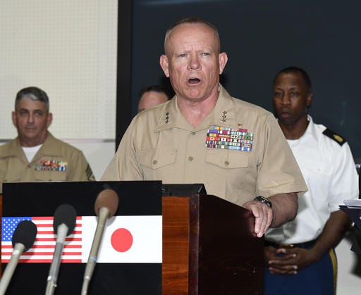 Lt. Gen. Lawrence D. Nicholson, U.S. Marine Corps Commanding General of III Marine Expeditionary Force, speaks during a press conference at the USMC Camp Foster in Okinawa, Japan after a former Marine was arrested on suspicion of killing a woman on the southern Japanese island. The Marine Corps commander in Japan said Saturday the U.S. military in Japan is restricting celebrations and off-base alcohol consumption in Okinawa in an effort to show respect for the victim’s family and mourn with the people of Okinawa.(Sadayuki Goto/Kyodo News via AP) JAPAN OUT, MANDATORY CREDIT