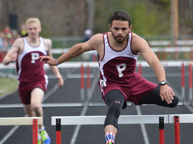 Portsmouth High School senior Joey Auger, right, and classmate Eddie Carroll (back) will try to lead the Clippers back to Division II track glory at today's championship meet. The meet starts at 10 a.m. at PHS. Mike Whaley/Fosters.com