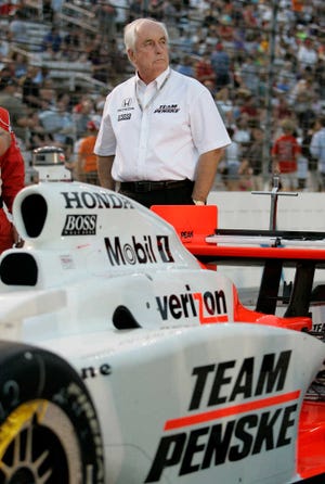 Team owner Roger Penske stands near Ryan Briscoe's car before an IndyCar Series race at Texas Motor Speedway on June 6, 2009, in Fort Worth, Texas. (AP Photo/Tony Gutierrez)