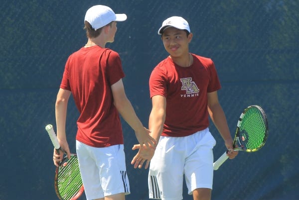 Freshmen Robert Cash, left, and Joel Jose of New Albany won two matches Friday to reach a Division I semifinal Saturday.