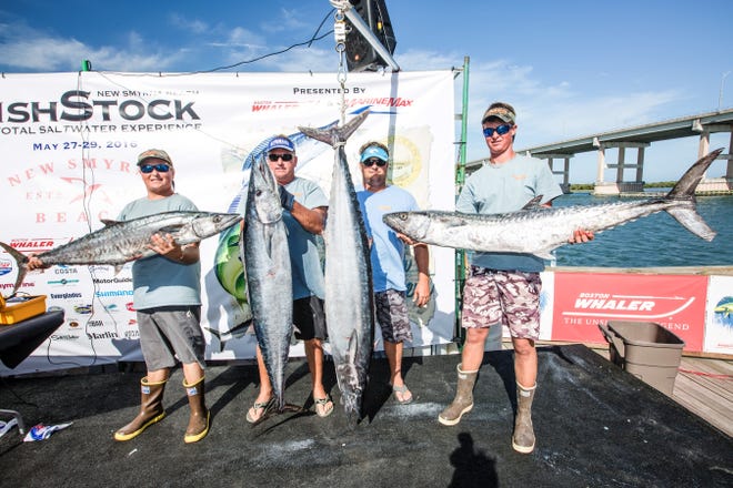 Team Marine Specialties, Connor Sikorski, left, Brandon Risley, Donnie Sikorski and Hunter Carr, show off their wahoo and king catch from the first day of the FishStock Striker Tournament. FISHSTOCK/ZACH STOVALL
