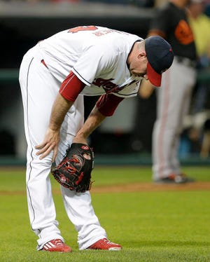Cleveland Indians relief pitcher Zach McAllister reacts after giving up a two-run home run to Baltimore Orioles' Mark Trumbo during the seventh inning of a baseball game, Friday, May 27, 2016, in Cleveland. (AP Photo/Tony Dejak)