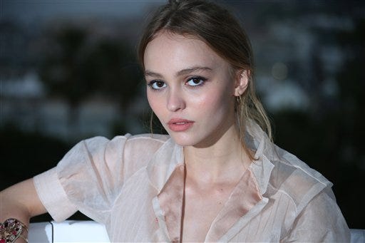 FILE - In this May 14, 2016 file photo, actress Lily-Rose Depp poses during portraits for the film La Danseuse (The Dancer) at the 69th international film festival, Cannes, southern France. Chanel has tapped Johnny Depp's 16-year-old daughter to represent a new perfume, announced on Lily-Rose Depp's Instagram account on May 23, 2016. Depp's mother is model Vanessa Paradis. (AP Photo/Joel Ryan, File)