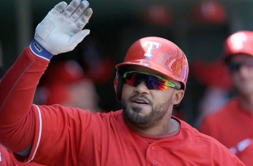 Texas Rangers designated hitter Prince Fielder celebrates his solo home run during the fourth inning of a baseball game against the Pittsburgh Pirates in Arlington, Texas, Sunday, May 29, 2016. (AP Photo/LM Otero)