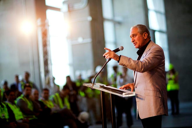 Atlanta Falcons owner Arthur Blank speaks during a news conference inside the team's new stadium currently under construction Monday, May 16, 2016, in Atlanta. Blank says the Mercedes-Benz Stadium is on schedule to open in June, 2017 as scheduled and he's hoping it will be announced next week as the site of a Super Bowl.