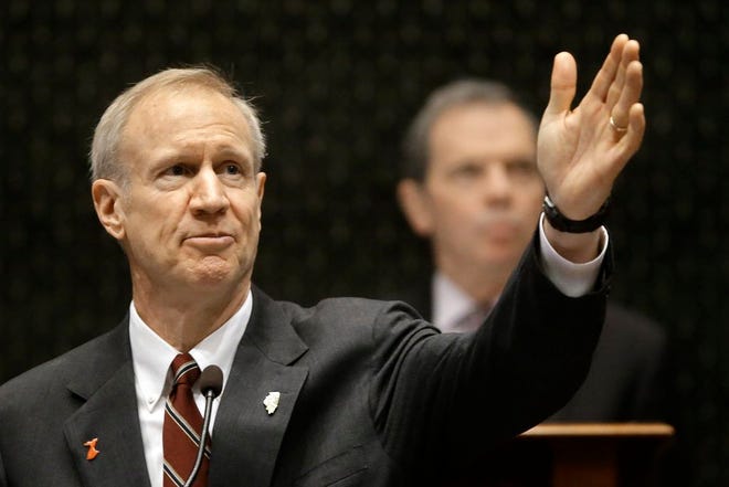 Illinois Gov. Bruce Rauner delivers his second budget address to a joint session of the General Assembly in the House chambers at the Capitol Wednesday, Feb. 17, 2016, in Springfield, Ill. (AP Photo/Seth Perlman)