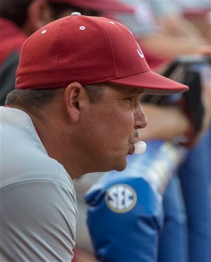 Alabama coach Mitch Gaspard blows a bubble as his team bats against Mississippi State in the Southeastern Conference baseball tournament, Wednesday, May 25, 2016, at the Hoover Met in Hoover, Ala. (Vasha Hunt/AL.com via AP)