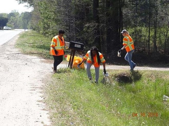 Dinwiddie High School JROTC cadets pick up trash along Boydton Plank Road in Dinwiddie on April 18. Contributed Photo