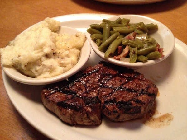 Texas Roadhouse serves up Texas-sized steaks in a fun setting, including a line-dancing wait staff. The Dallas filet is the most tender, according to the menu, and comes with two sides.