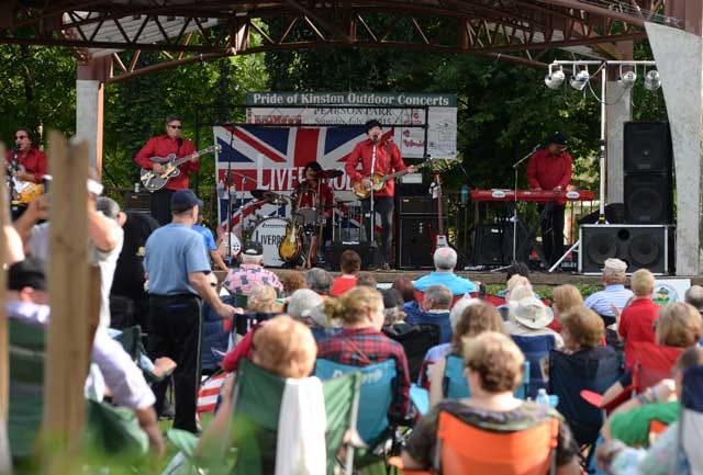 Beatles tribute band Liverpool plays to a large crowd at Pearson Park during a special Fourth of July Sand in the Streets show in 2015.