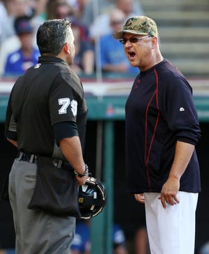 Cleveland Indians manager Terry Francona, right, yells at home plate umpire Manny Gonzalez after being ejected during the third inning of a baseball game Monday, May 30, 2016, in Cleveland. (AP Photo/Ron Schwane)