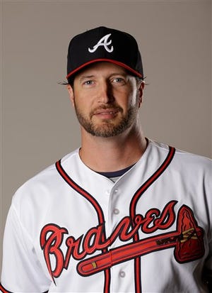 This Feb. 26, 2016 file photo shows Jason Grilli of the Atlanta Braves baseball team. The Toronto Blue Jays have added a veteran to their bullpen by acquiring Jason Grilli from the Atlanta Braves in exchange for a pitching prospect, Tuesday, May 31, 2016. (AP Photo/John Raoux, file)