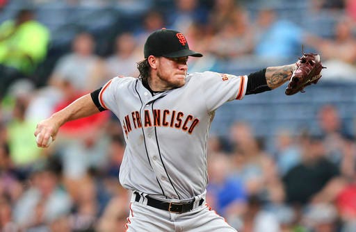 San Francisco Giants starting pitcher Jake Peavy delivers a pitch during the sixth inning of a baseball game against the Atlanta Braves on Tuesday, May 31, 2016, in Atlanta. (AP Photo/John Bazemore)