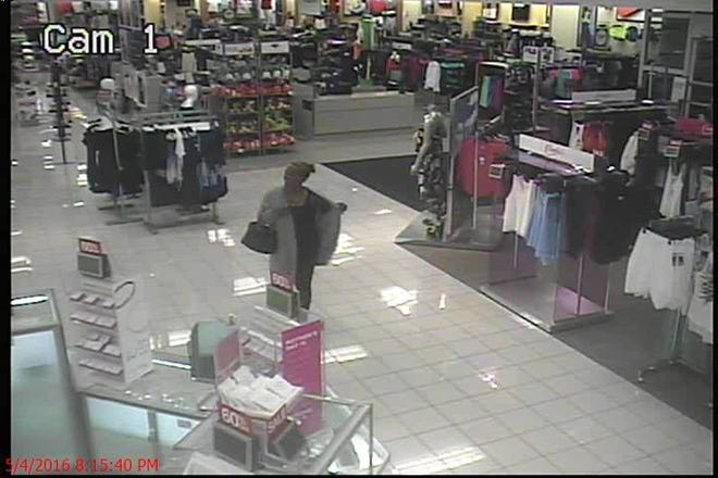 Pictured is one of two women who allegedly used a stolen identity to buy thousands of dollars' worth of items at area stores in early May.