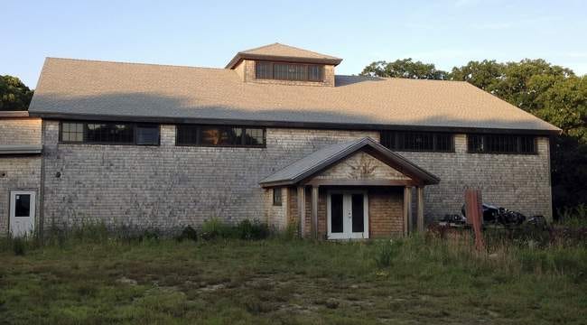 The state and the Wampanoag Tribe of Gay Head are asking a federal judge to settle whether the tribe can turn the unfinished community center in Aquinnah into a bingo hall. A hearing on the request is set for Aug. 12.