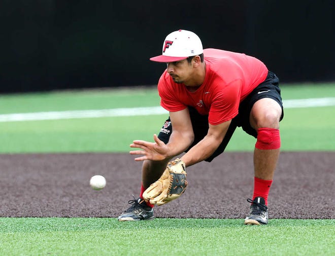 Fairfield shortstop Michael Conti takes infield during practice at Dan Law Field at Rip Griffin Park on Thursday.