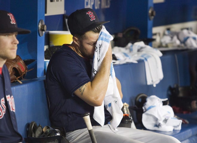 With Joe Kelly (pictured) sent to the minor leagues after struggling on Wednesday night, the Red Sox will go with a four-man pitching rotation for the next couple of weeks.